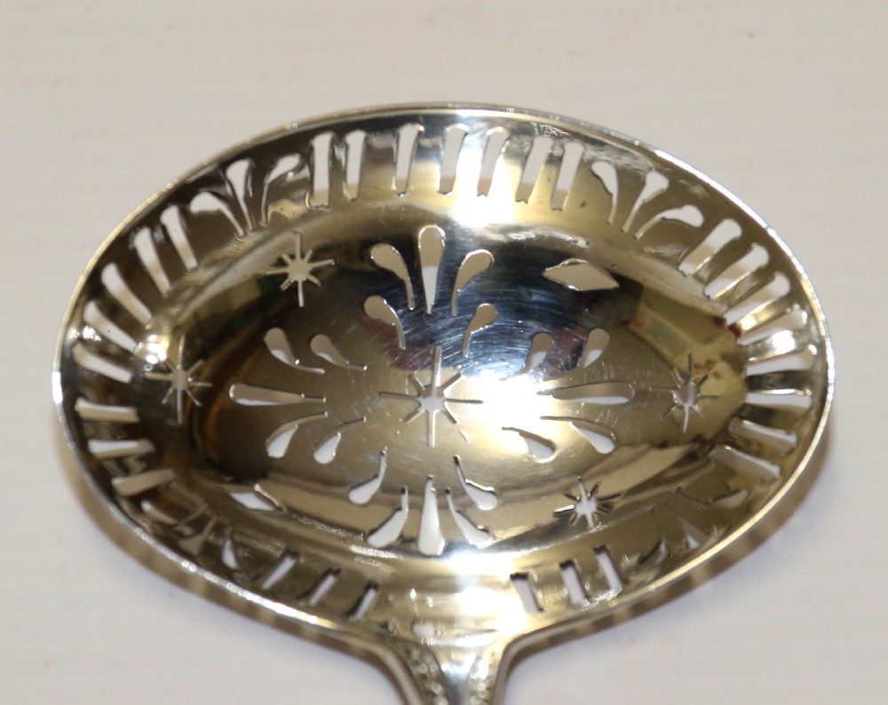 A rare George III period Irish Silver Sugar Spoon, Dublin 1810 View II