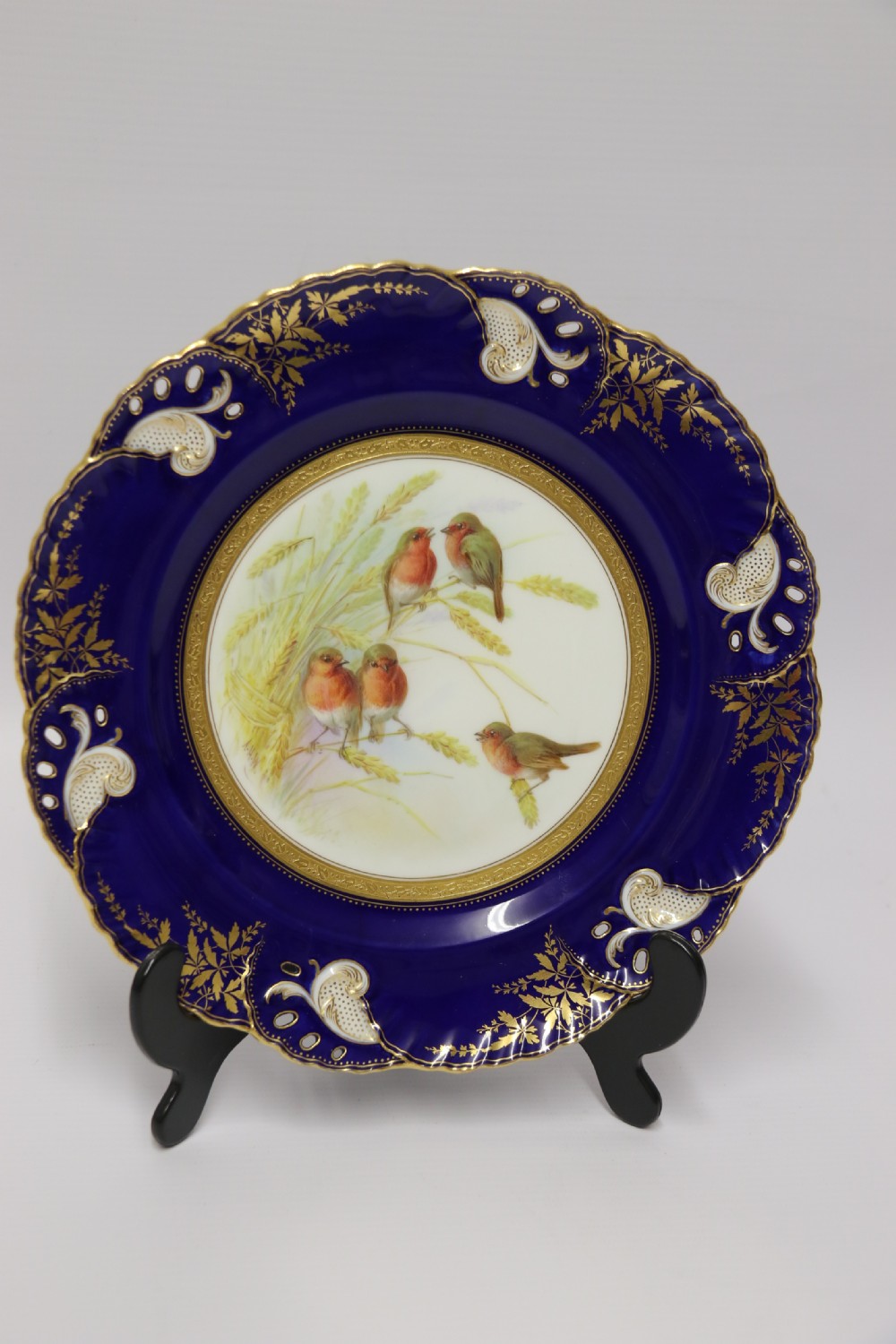 A charming Victorian Minton’s porcelain cabinet plate hand painted with Robins View XIV