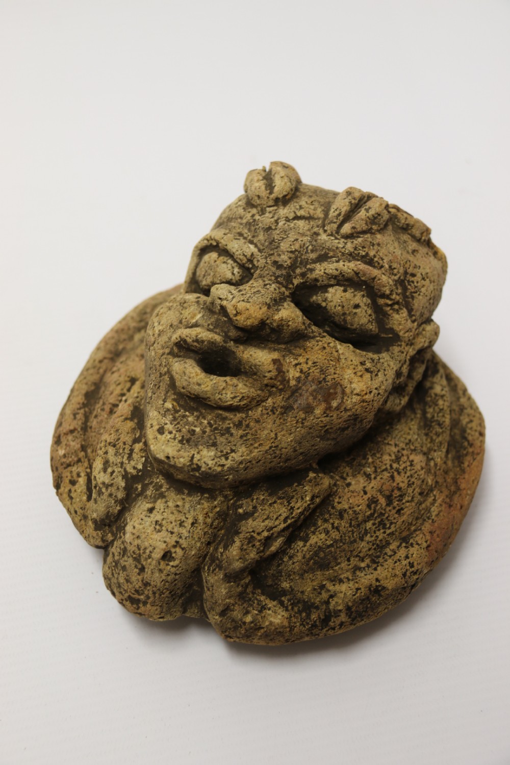 An ancient carved limestone Nomoli figurative pot from the Mende people of Sierra Leone View X