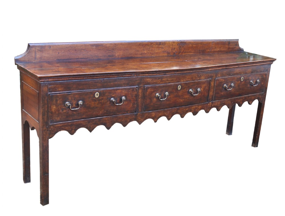 A good late 18th century three drawer oak dresser base  