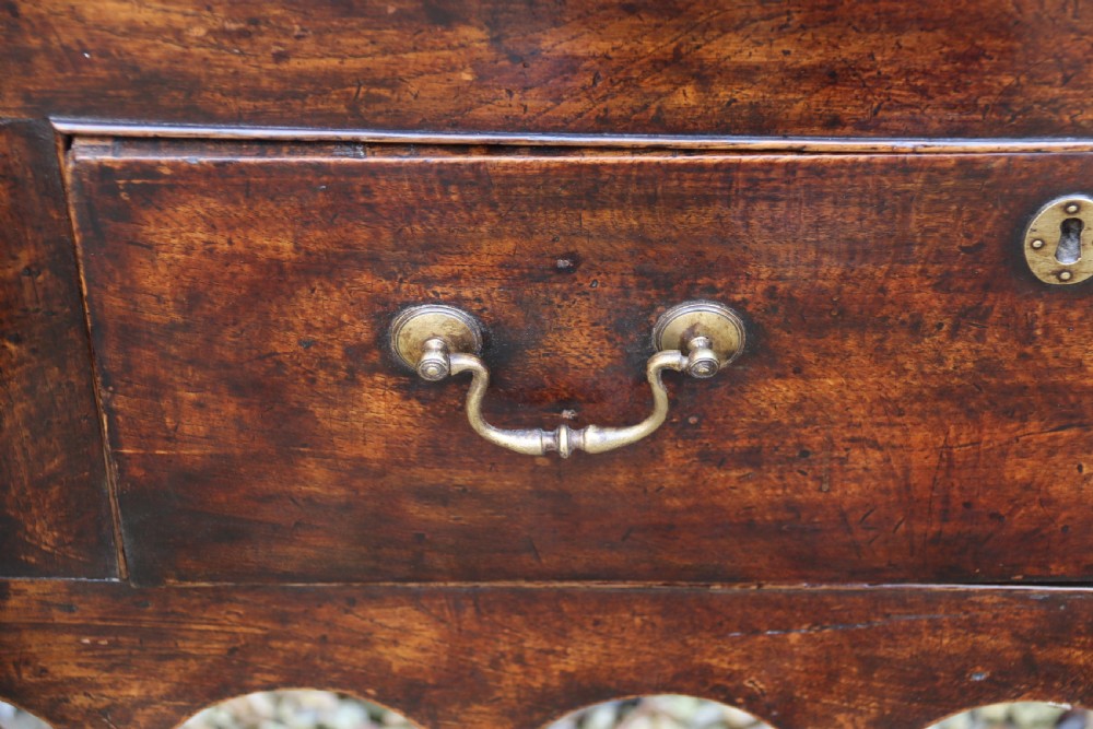 A good late 18th century three drawer oak dresser base   View XI