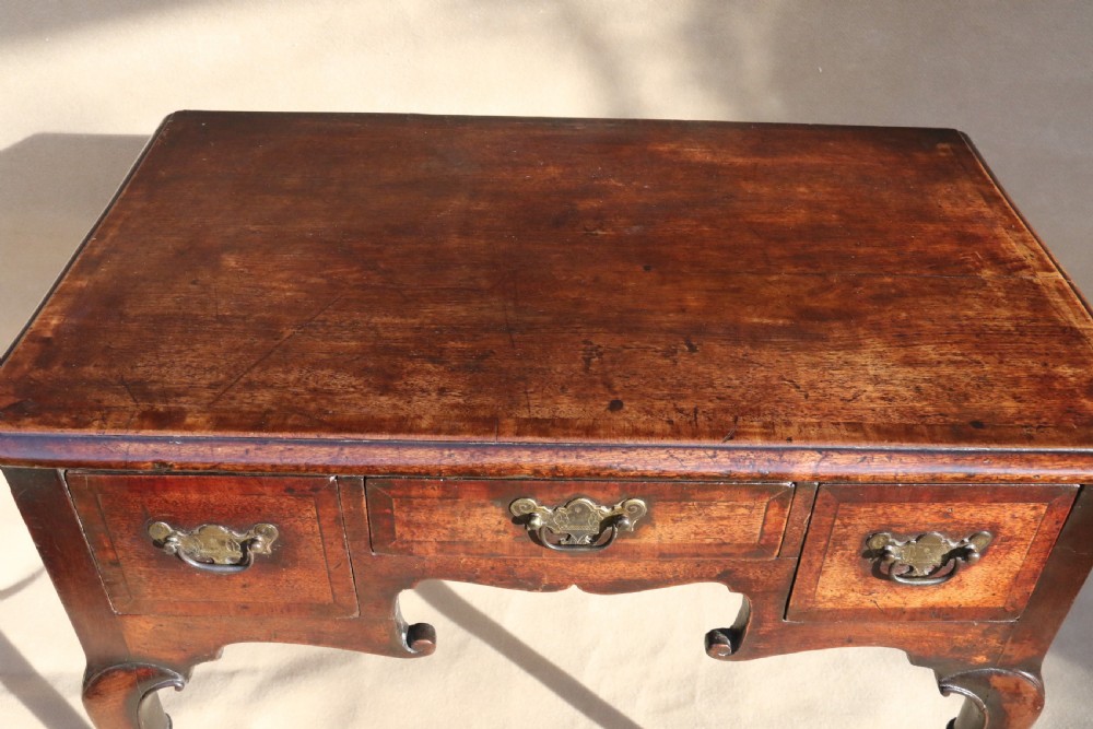 A rare early Georgian Walnut Low Boy, Circa 1730 View XV