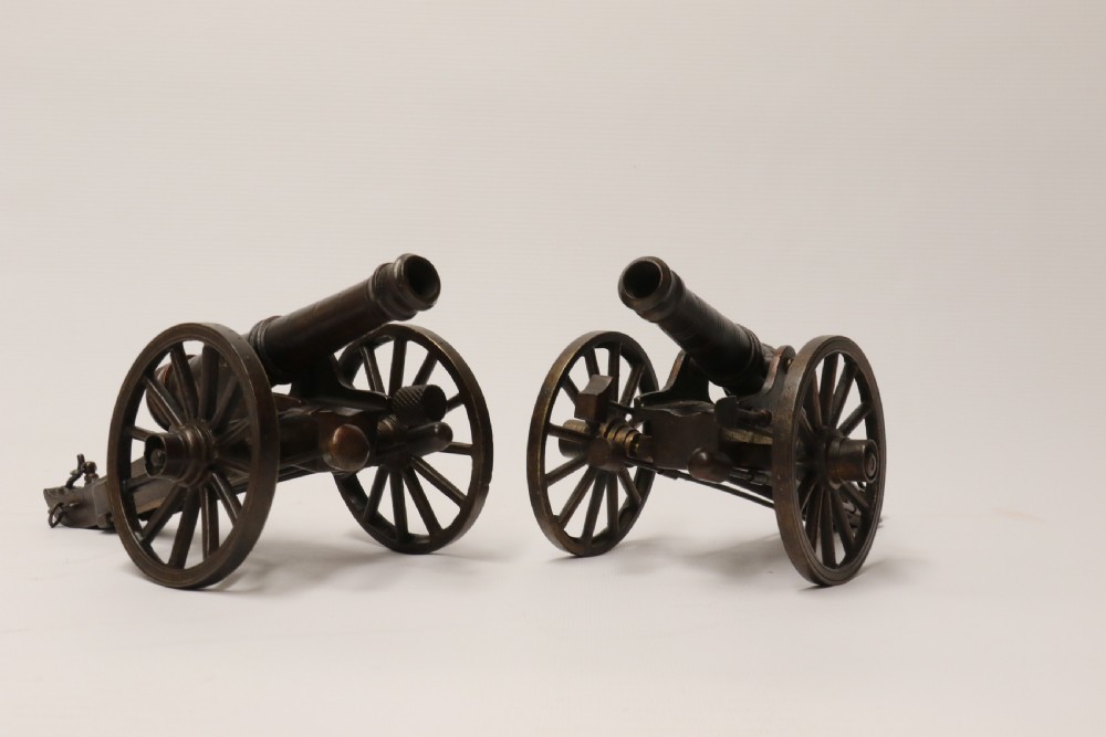 A rare pair of French mid 19th C bronze model cannons View II