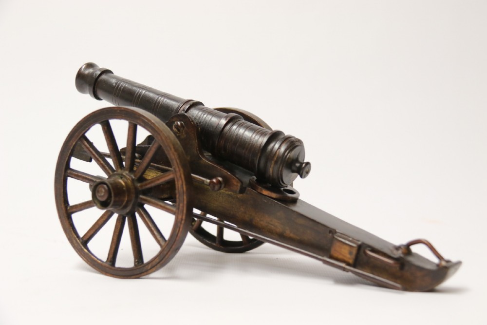 A rare pair of French mid 19th C bronze model cannons View XI