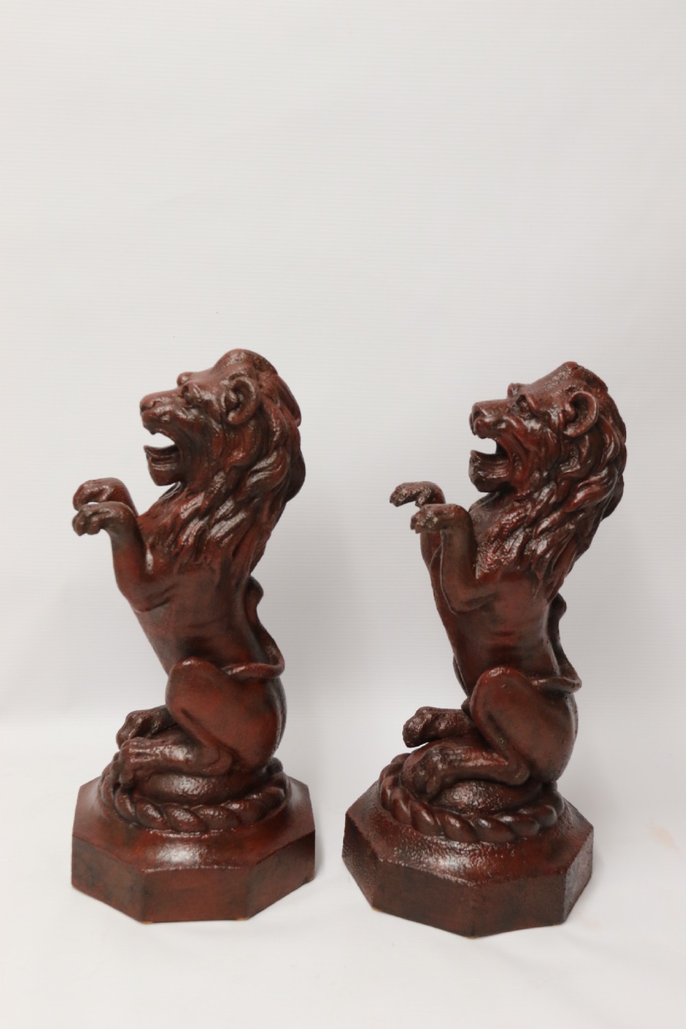 A pair of Regency period cast iron lion doorstops View III