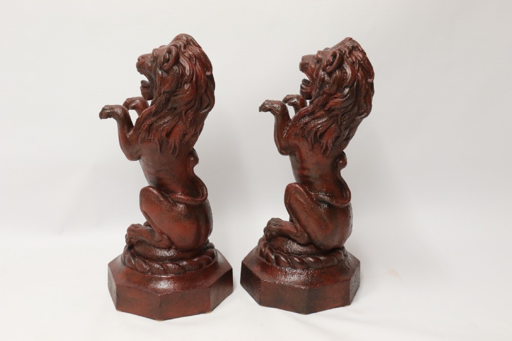 A pair of Regency period cast iron lion doorstops View IV
