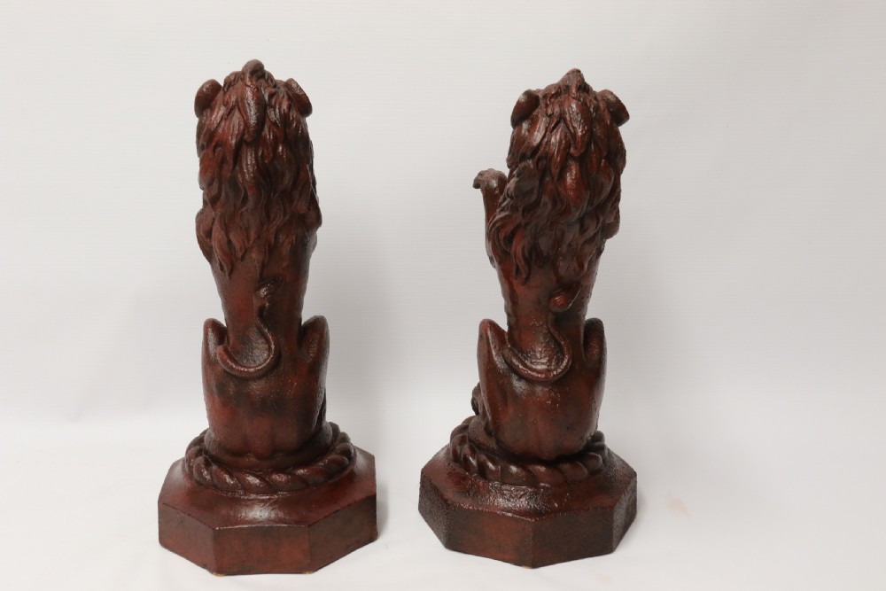 A pair of Regency period cast iron lion doorstops View V
