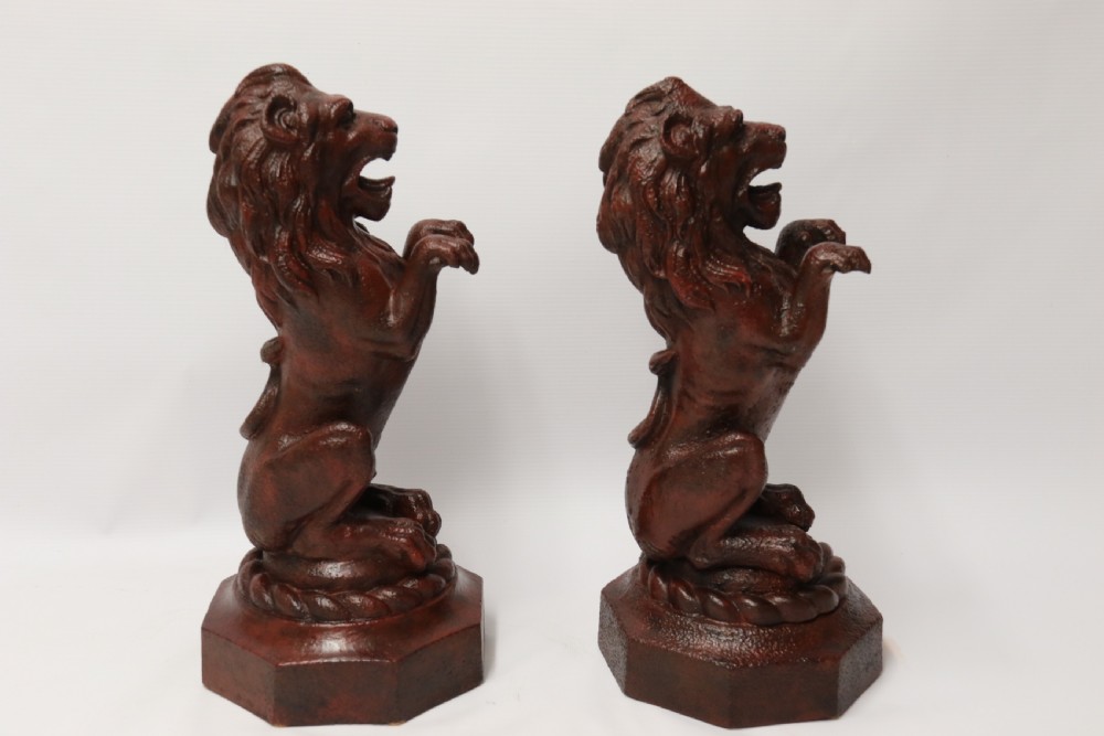 A pair of Regency period cast iron lion doorstops View VI