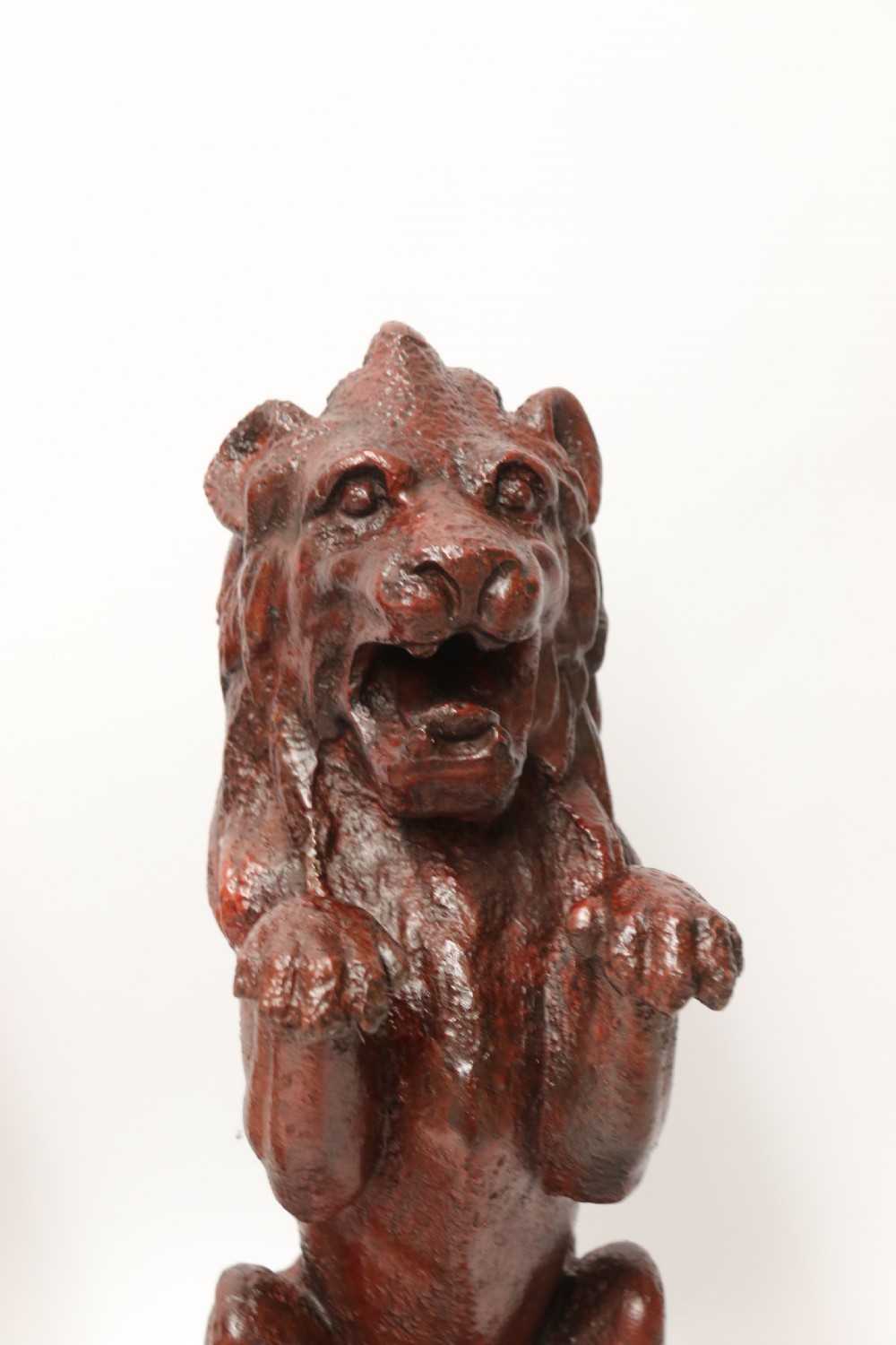 A pair of Regency period cast iron lion doorstops View IX