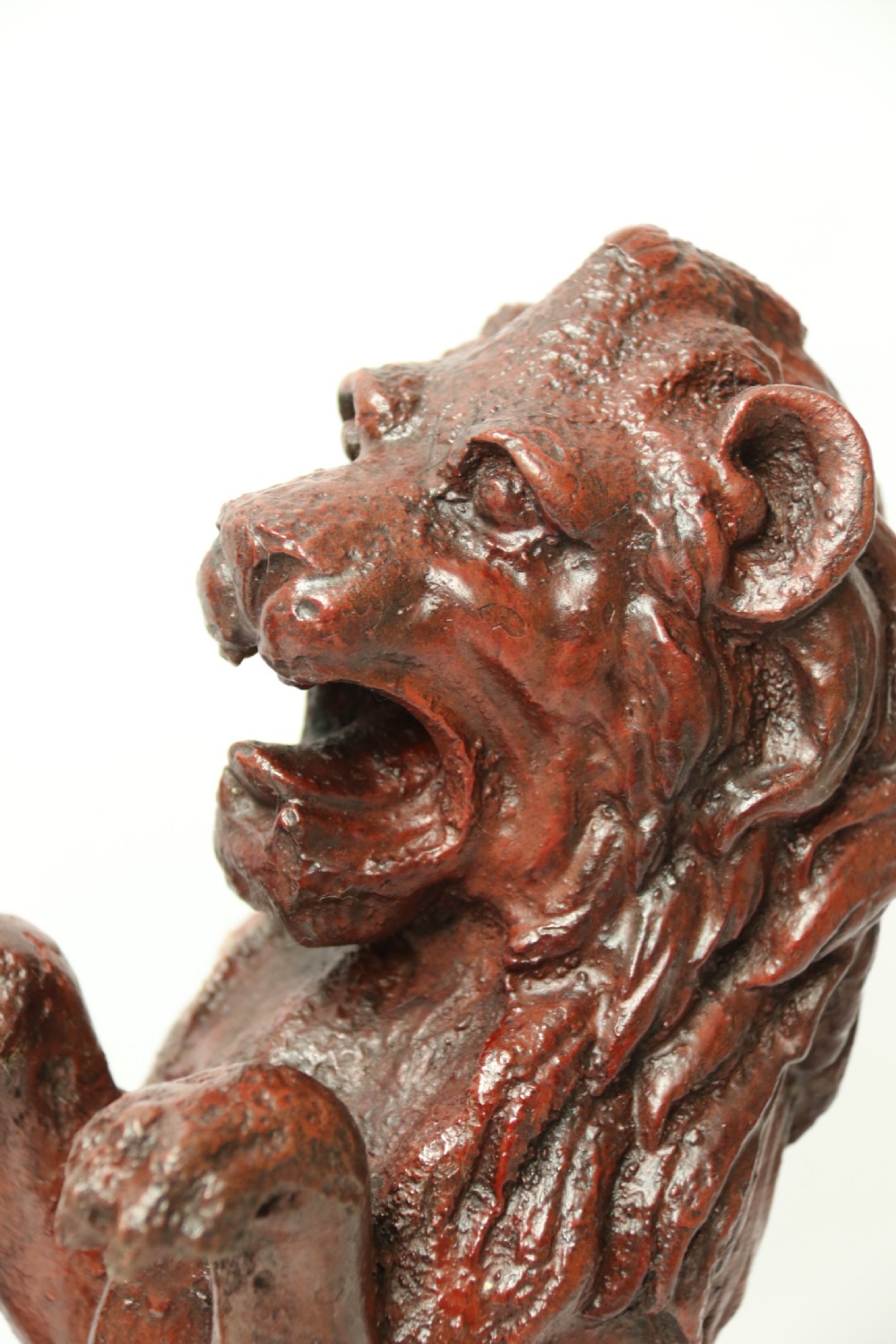 A pair of Regency period cast iron lion doorstops View X