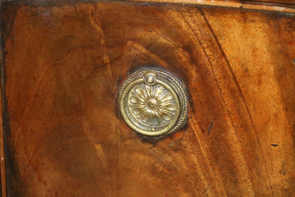 A Georgian serpentine fronted side table with writing and dressing fitment View XIV