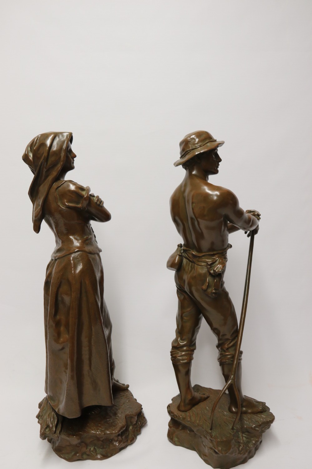 A beautiful pair of large bronze figures depicting farm workers View VII