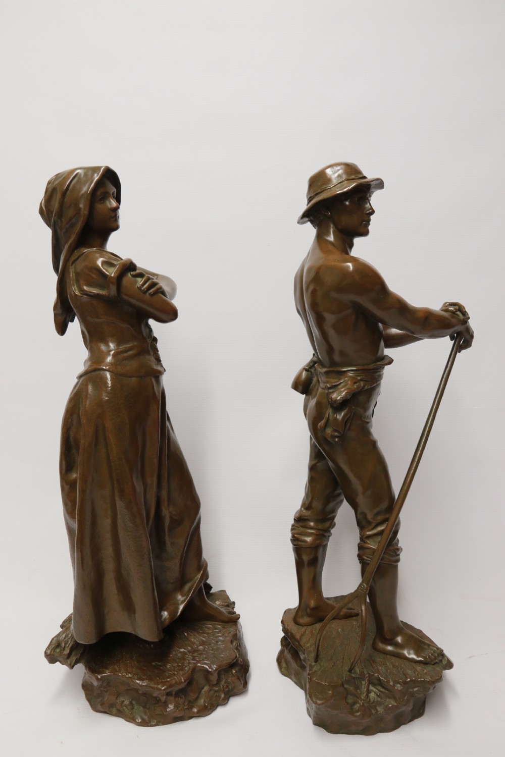 A beautiful pair of large bronze figures depicting farm workers View VIII