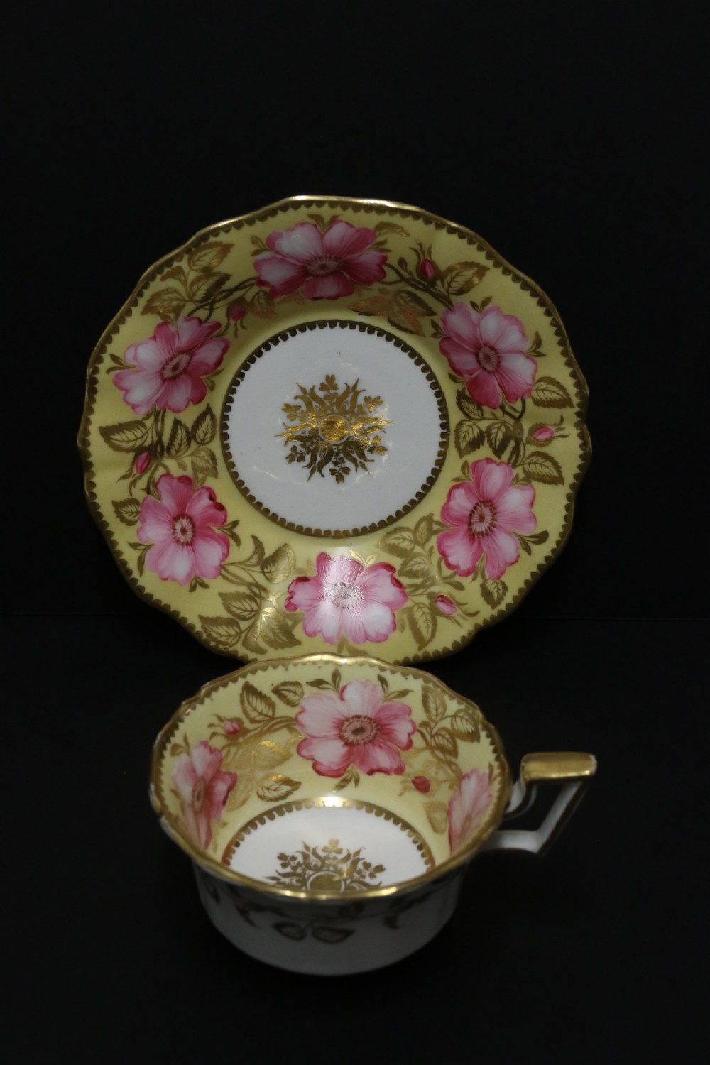 A beautifully painted early 19th c porcelain cabinet cup and saucer