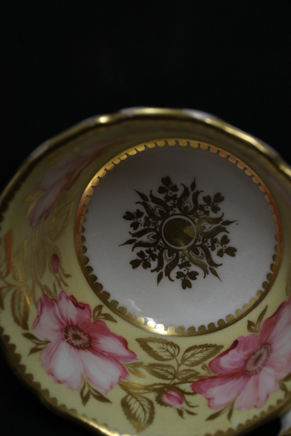 A beautifully painted early 19th c porcelain cabinet cup and saucer View VI