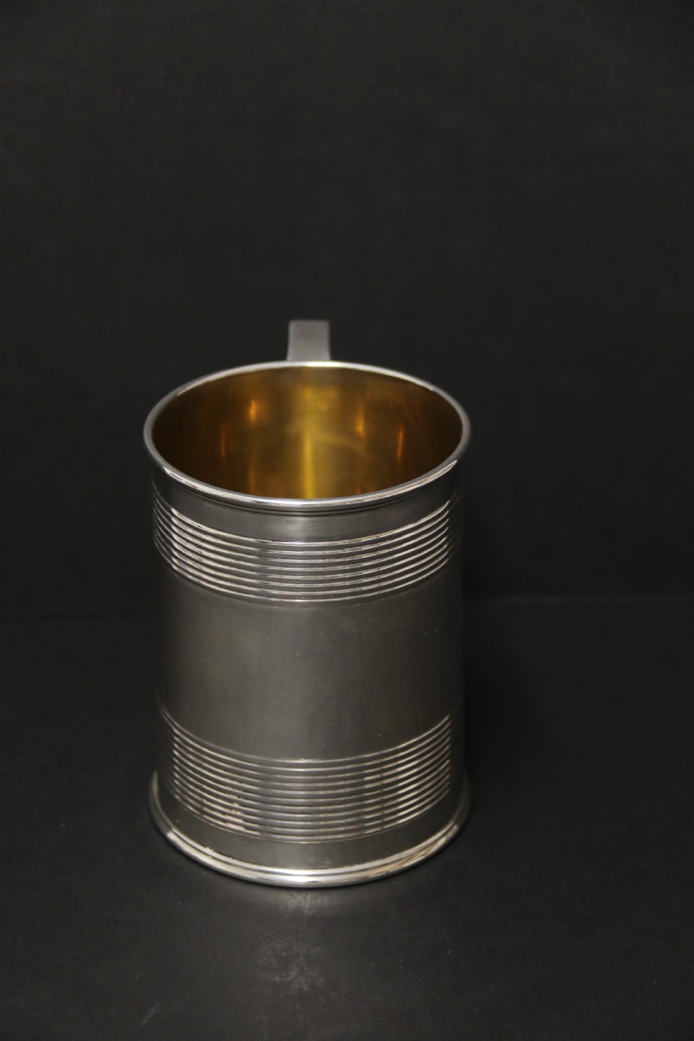 A heavy solid silver pint tankard London 1922-3 View VI