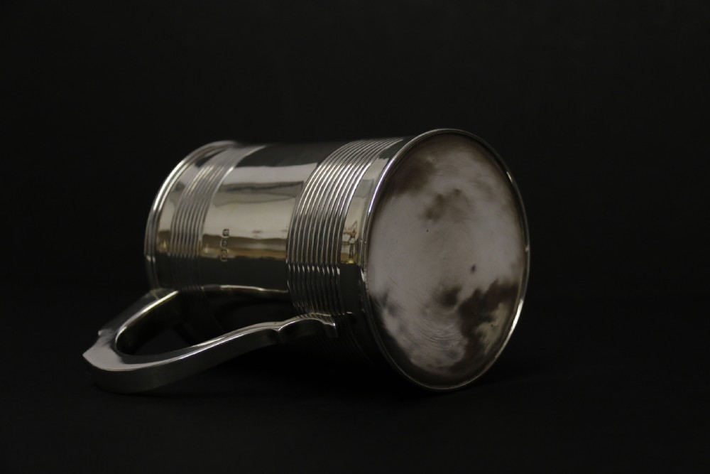A heavy solid silver pint tankard London 1922-3 View VIII