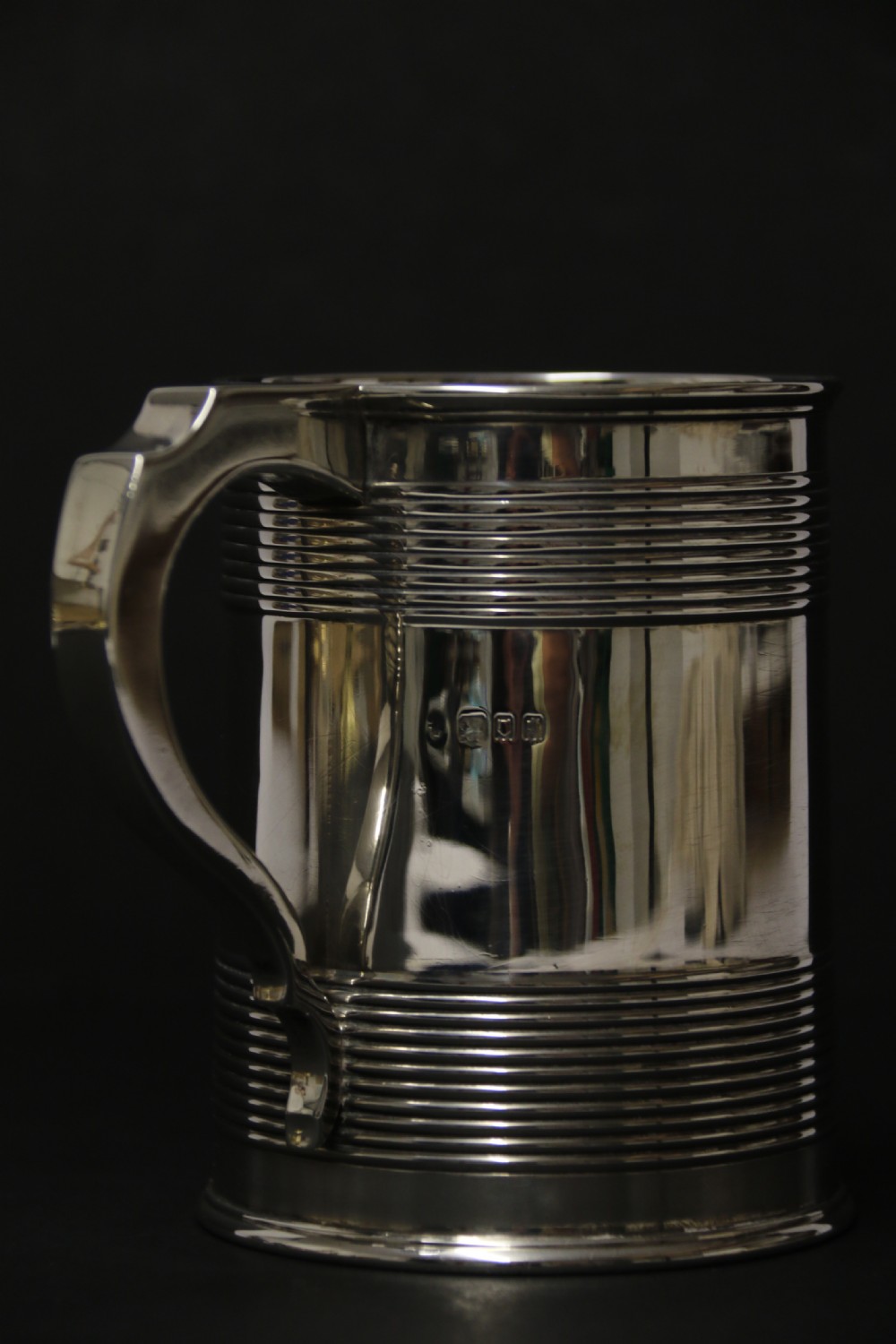 A heavy solid silver pint tankard London 1922-3 View IX