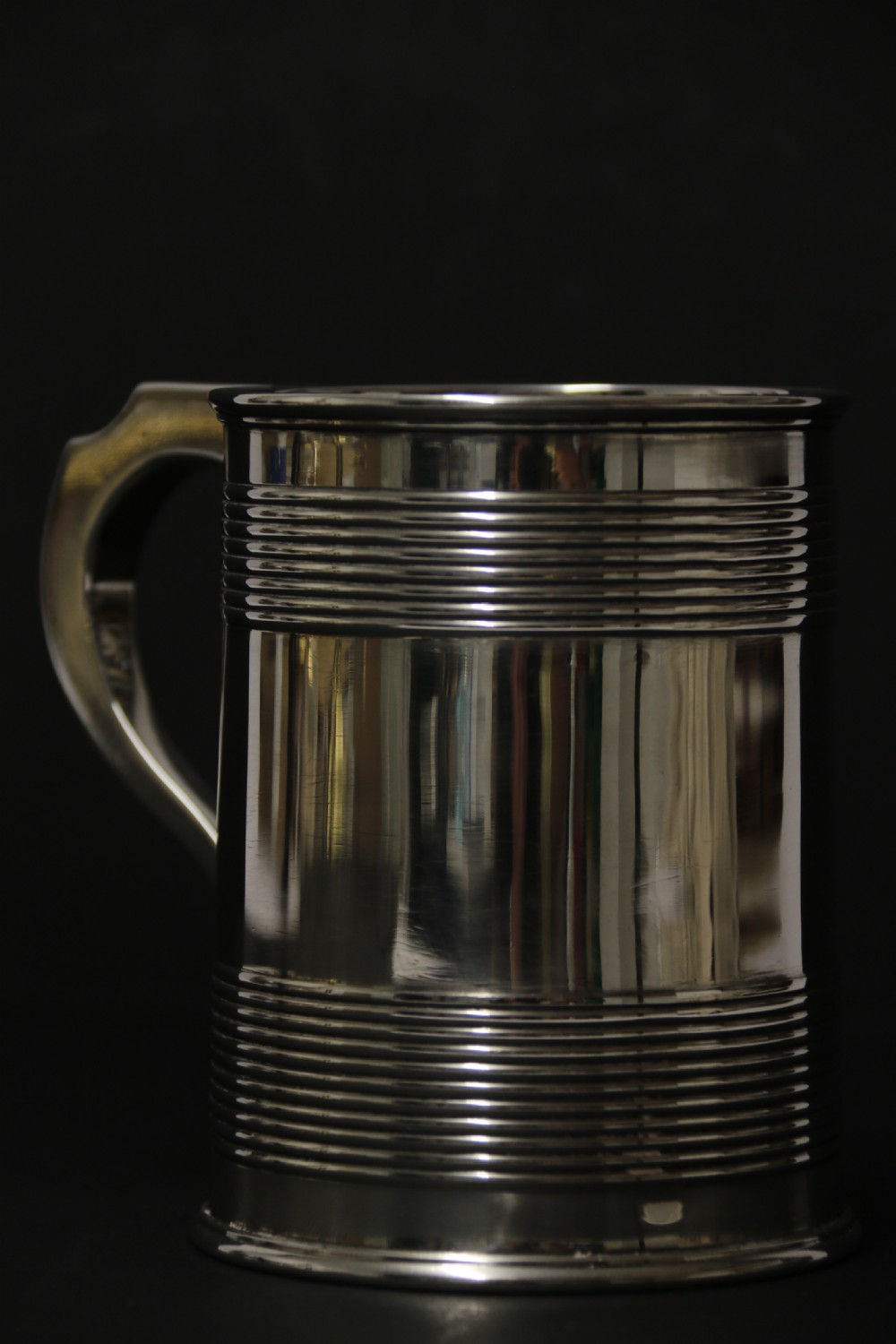 A heavy solid silver pint tankard London 1922-3 View XI