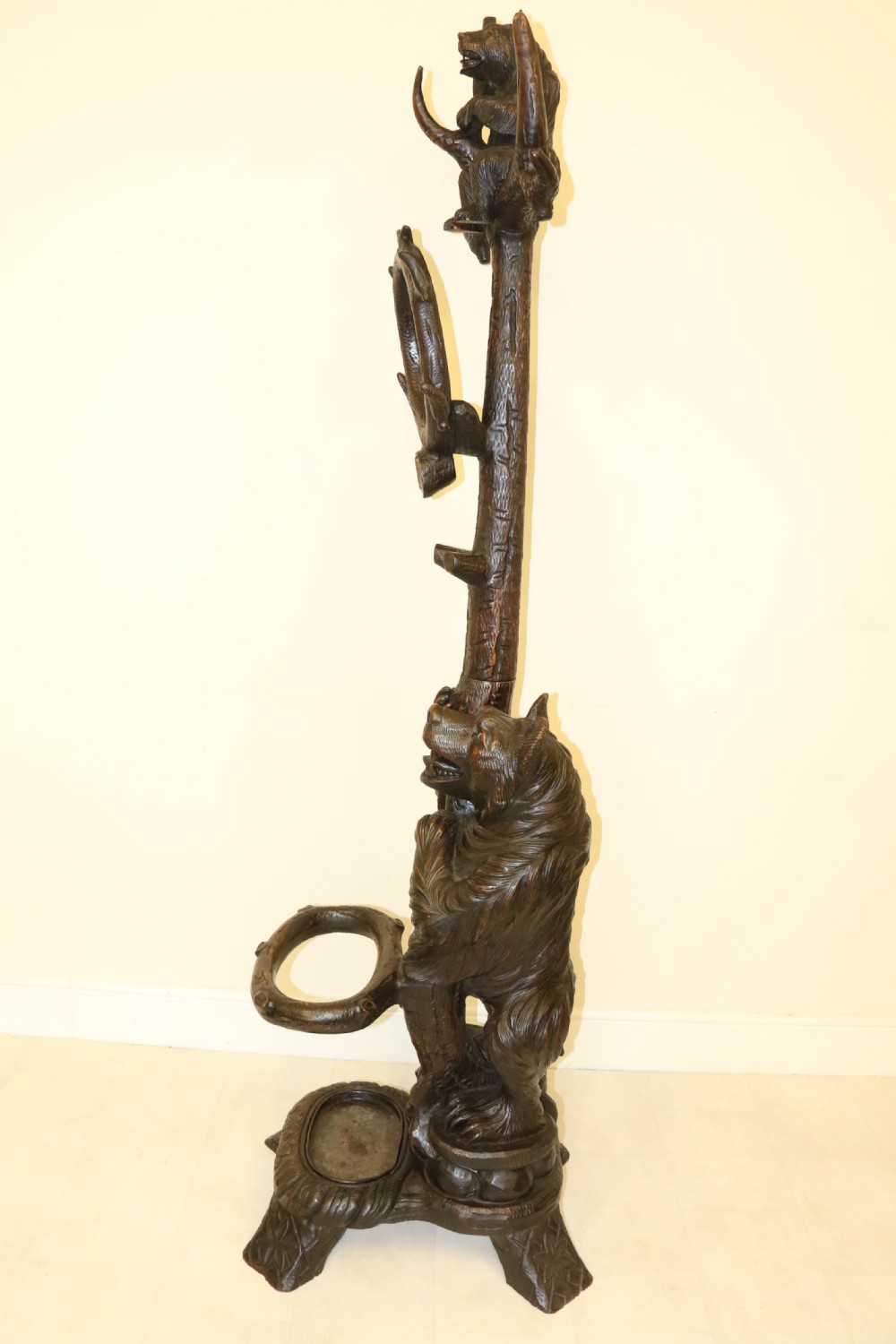 A highly decorative black forest carved wood bear hall stand  View V