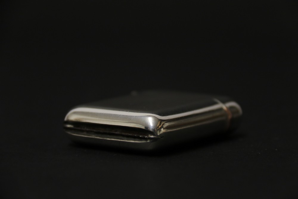 An Edwardian silver and gold seamless  vesta case by Sampson Mordan View VII