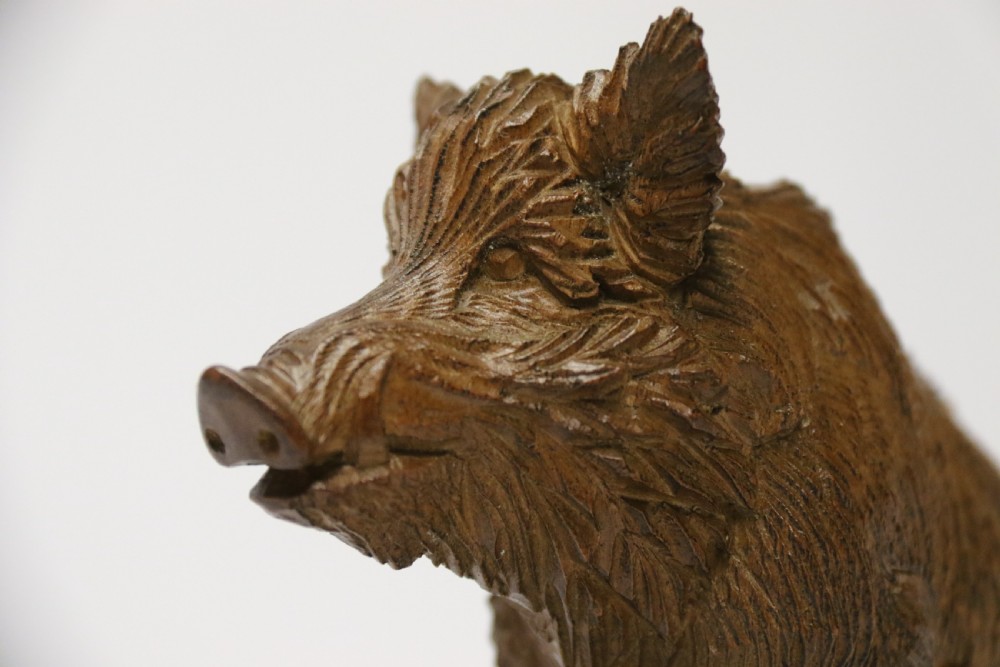 A fine Black Forest limewood carved study of a boar. View XII