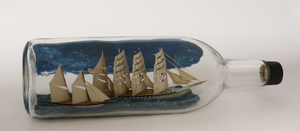 A fine folk art diorama with twin ships in a bottle, c 1930 View X