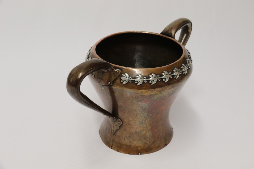 A fine copper and silver mounted Arts and Crafts vase by A E Jones View II
