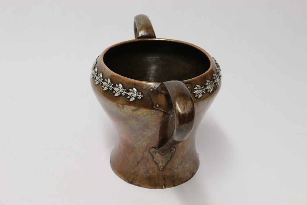 A fine copper and silver mounted Arts and Crafts vase by A E Jones View III