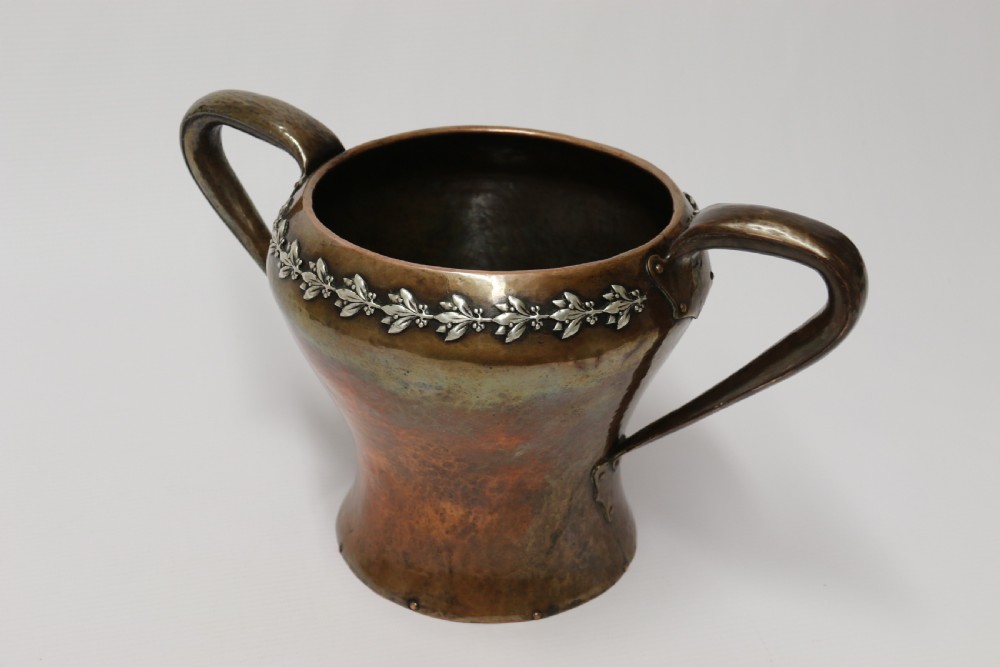 A fine copper and silver mounted Arts and Crafts vase by A E Jones View IV