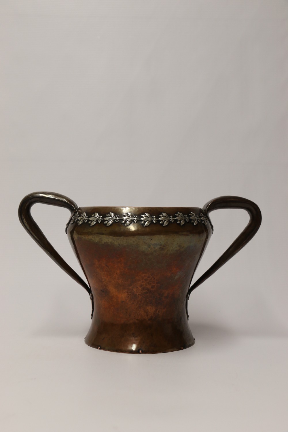 A fine copper and silver mounted Arts and Crafts vase by A E Jones View V