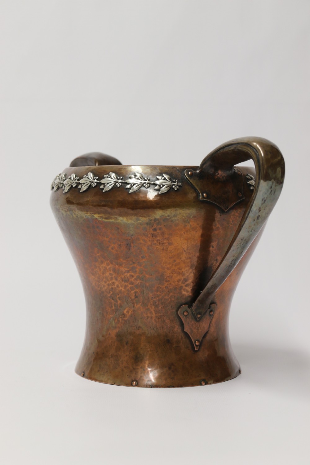 A fine copper and silver mounted Arts and Crafts vase by A E Jones View VII