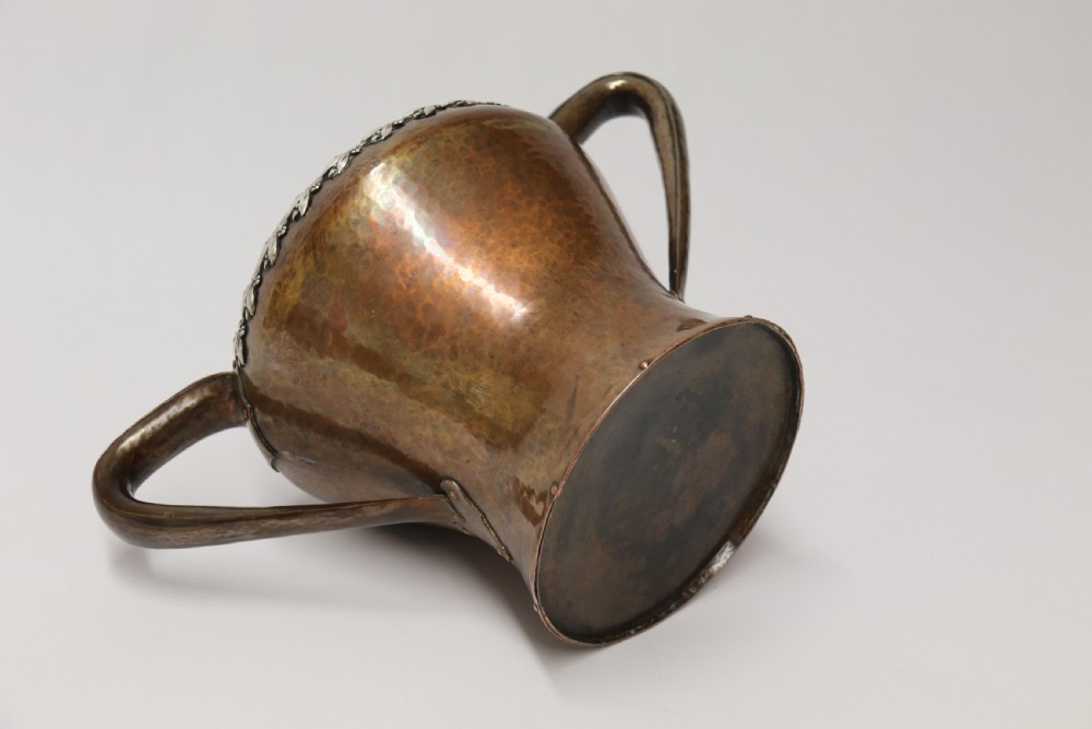 A fine copper and silver mounted Arts and Crafts vase by A E Jones View VIII