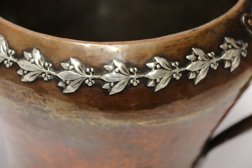 A fine copper and silver mounted Arts and Crafts vase by A E Jones View X