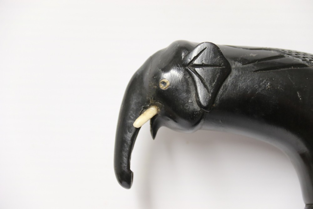 A decorative Raj period Indian carved ebony walking stick View III