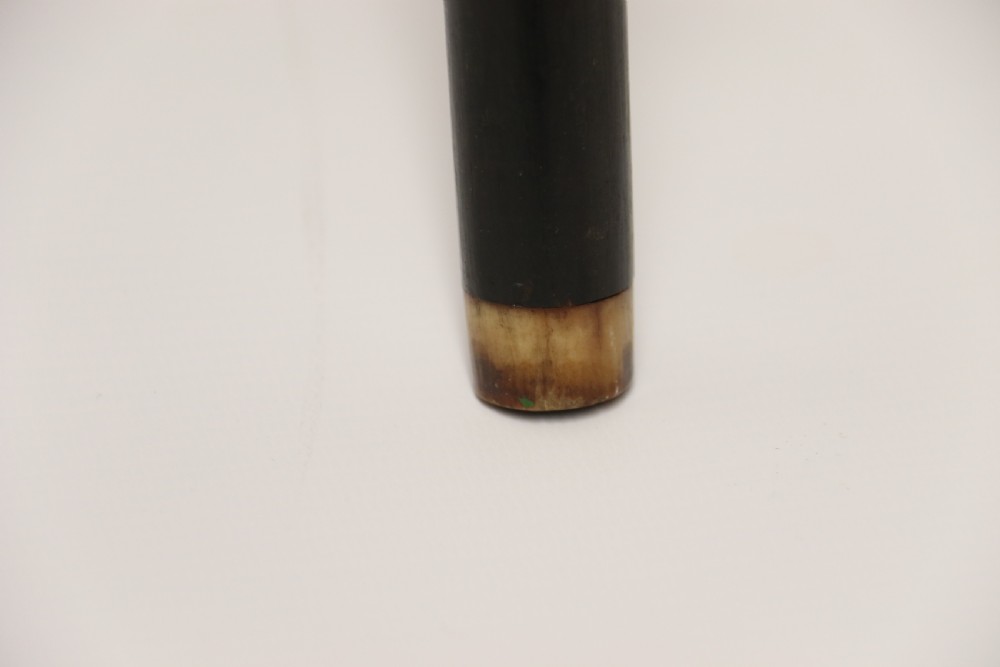 A decorative Raj period Indian carved ebony walking stick View X