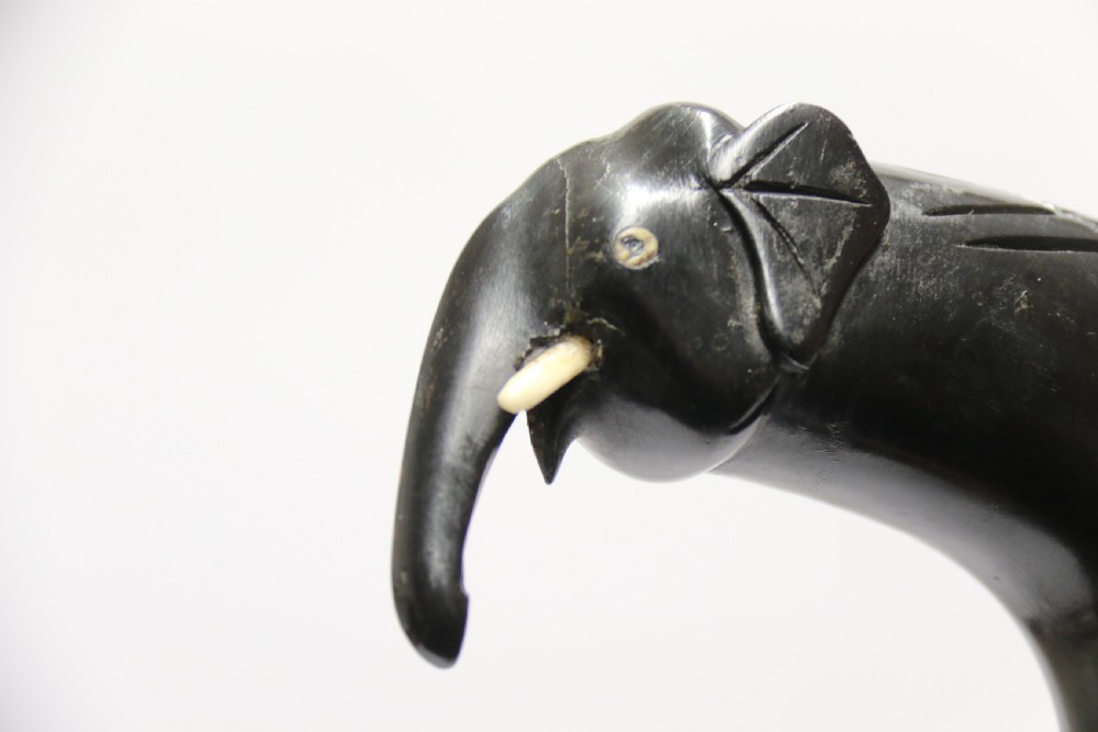 A decorative Raj period Indian carved ebony walking stick View XIV