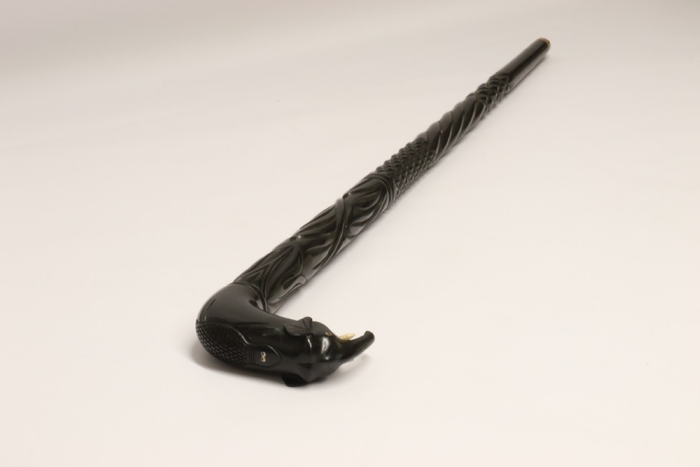 A decorative Raj period Indian carved ebony walking stick View XVI