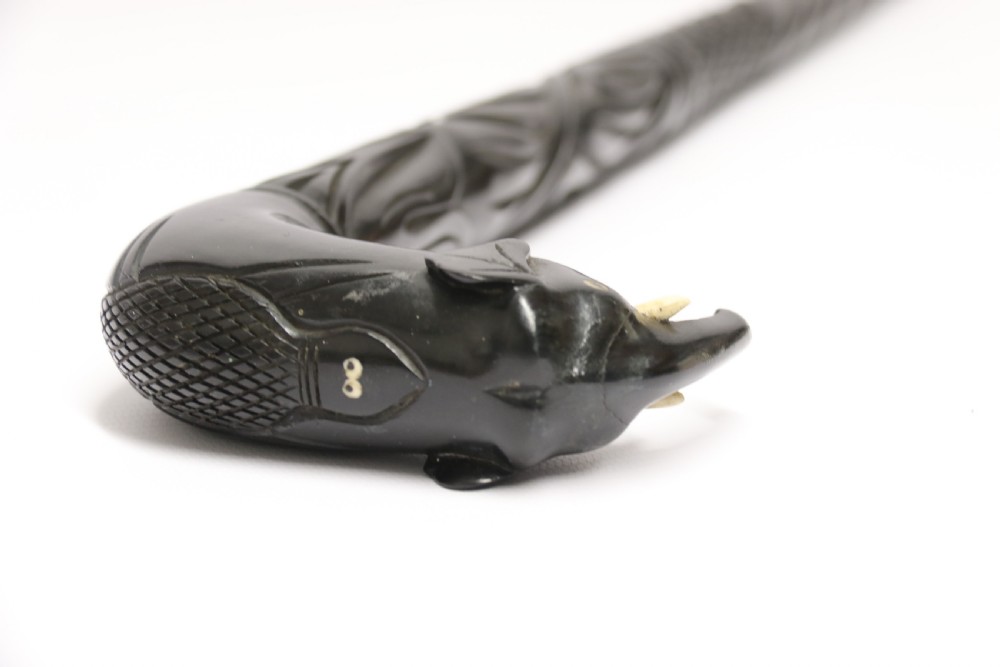 A decorative Raj period Indian carved ebony walking stick View XVII