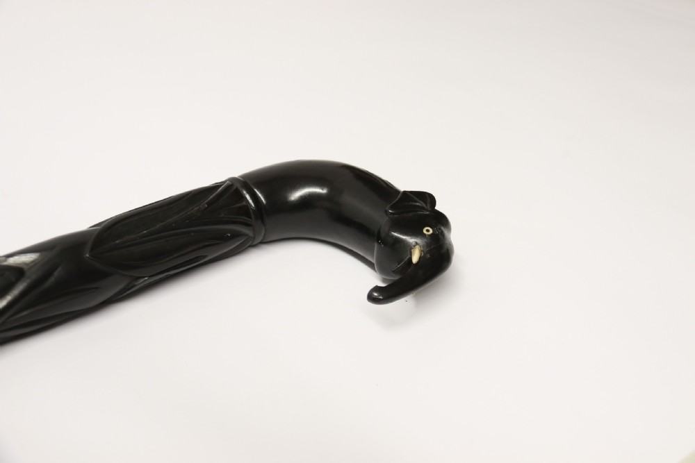 A decorative Raj period Indian carved ebony walking stick View XX