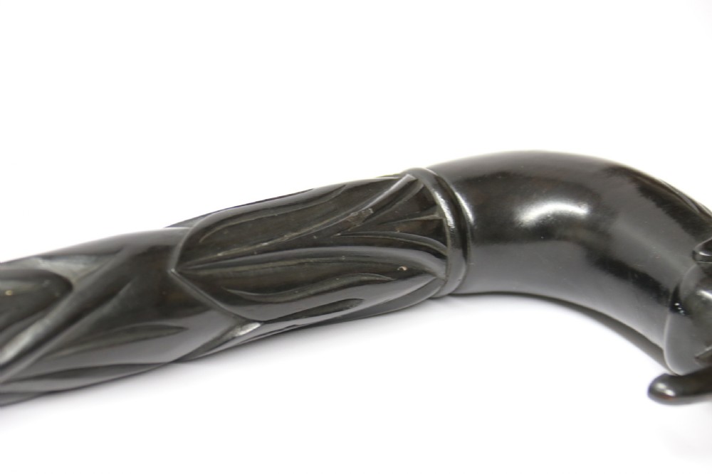 A decorative Raj period Indian carved ebony walking stick View XXIII