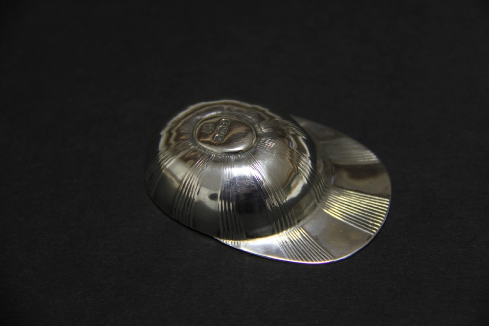 A rare  antique silver Tea Caddy Spoon in the form of a jockey cap   View II
