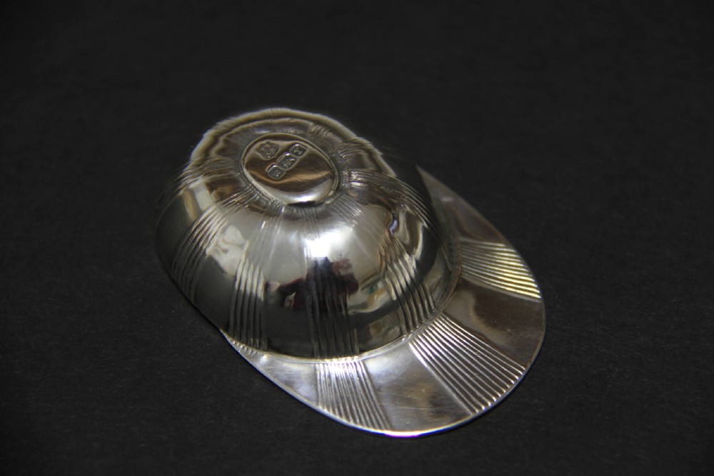 A rare  antique silver Tea Caddy Spoon in the form of a jockey cap   View III