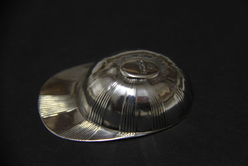 A rare  antique silver Tea Caddy Spoon in the form of a jockey cap   View IV