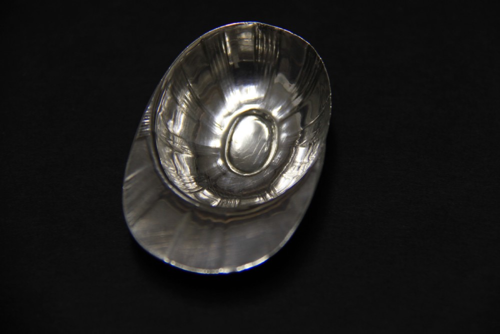 A rare  antique silver Tea Caddy Spoon in the form of a jockey cap   View V