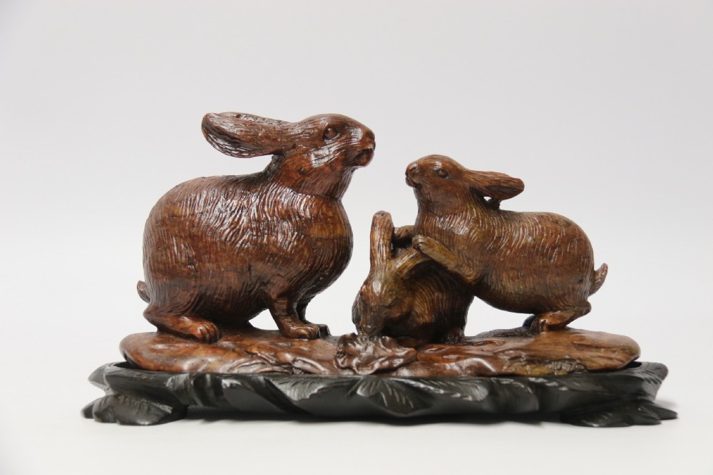 A 19th century Chinese carved soapstone Rabbit  group  