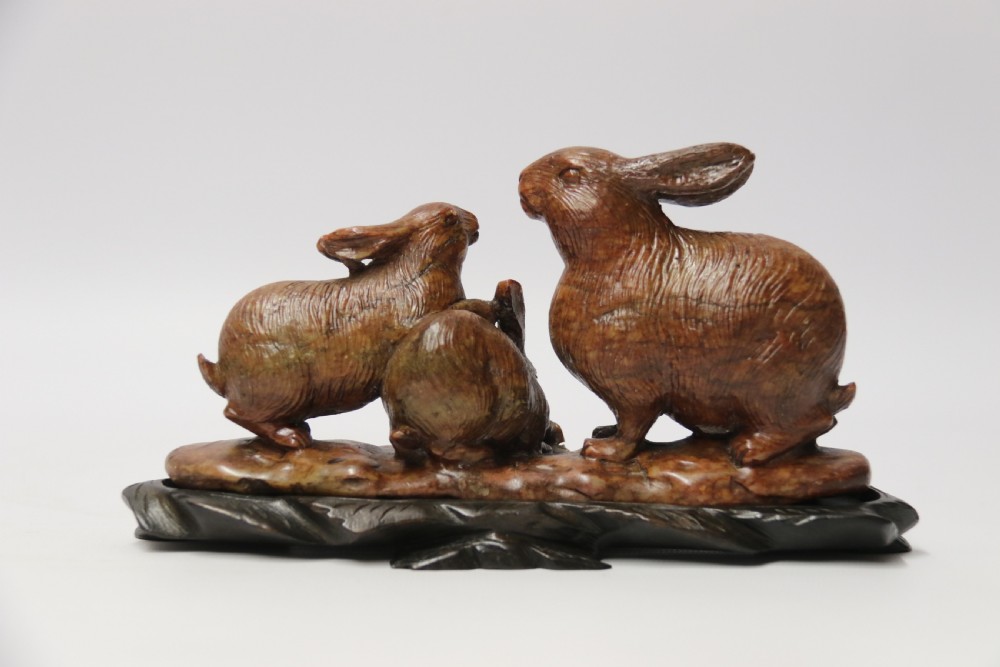 A 19th century Chinese carved soapstone Rabbit  group   View III