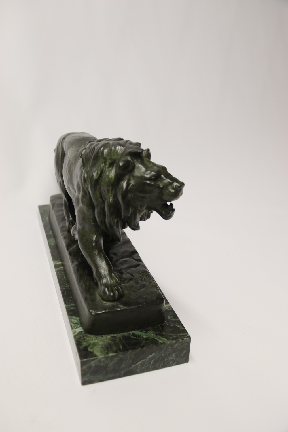 A late 19th C French bronze study of a Lion by Vidal View III