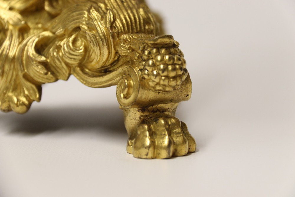 An exquisite pair of early 19th C French ormolu Candlesticks View VIII