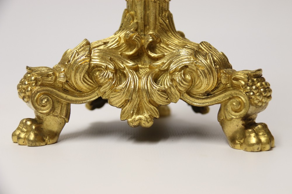 An exquisite pair of early 19th C French ormolu Candlesticks View IX